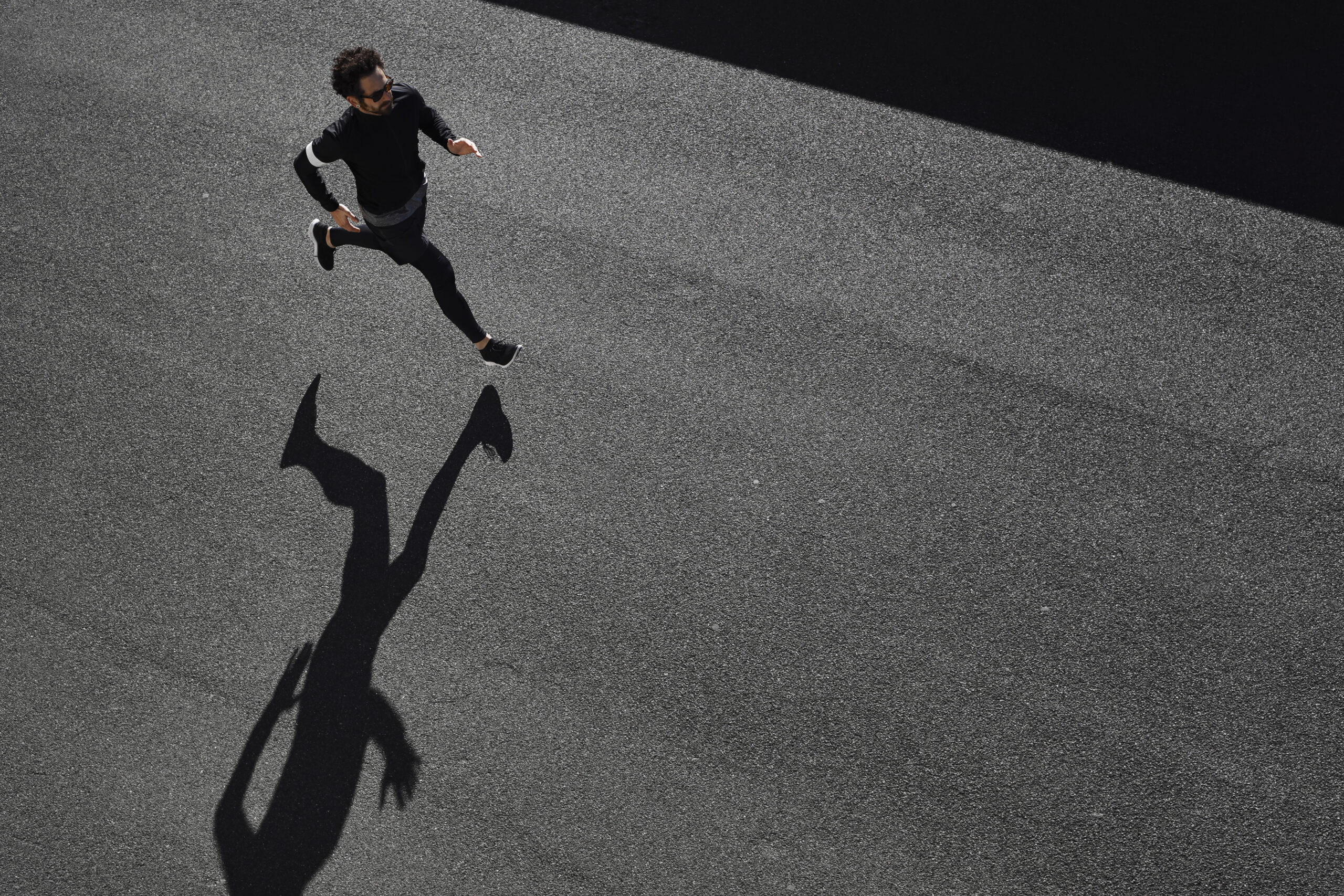 man-sportswear-running-road